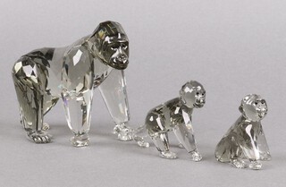 Three Swarovski Crystal Endangered Wildlife Collection figures - Gorilla 2009, 10cm and Young Gorilla 2007 6.5cm, boxed 
