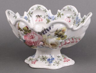 An Italian Nova faience tin glazed pottery boat shaped dish with floral decoration 15cm x 24cm x 18cm 