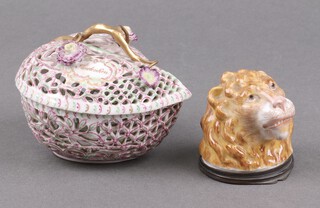 A Herend pierced porcelain heart shaped dish, the lid marked Andenken, the base marked Herend 1874 and signed 10cm, together with a 19th Century porcelain trinket box in the form of a lions mask 6cm 