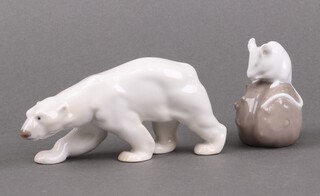 A Royal Copenhagen figure of a seated mouse 6cm together with a Bing & Grondahl figure of a polar bear 6cm 