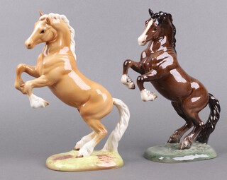 A Beswick figure of a rearing Welsh Cob 1014 25cm and 1 other rearing Palomino 25cm 