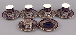 A Coalport 10 piece coffee service comprising 4 coffee cans (all ring flat), 6 saucers (3 ring flat), with 5 silver mounts London 1910 by The Goldsmiths and Silversmiths Company 136 grams 
