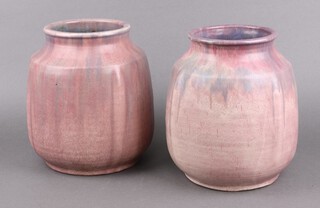 Up Church, a pair of purple Art Pottery vases 25cm, based signed Up Church 