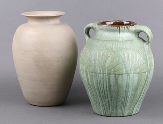 Wesuma Pottery, T W Lemon & Sons, a green Art Pottery twin handled vase, the base marked 500B, 25cm h, together with a Hillstonia cream glazed pottery vase 28cm 