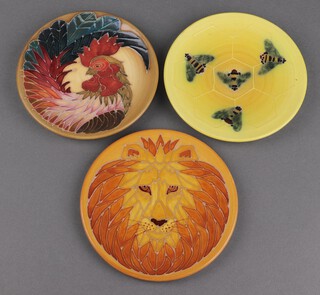 Sally Tuffin for Dennis Chinaworks, a circular plaque decorated a lion, the reverse marked Dennis Chinaworks no.4 impressed 1990, 16cm, 2 others - cockerel no.14 and bees and honeycomb limited edition no.7/200