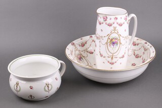 A Royal Doulton rose pattern jug and bowl set, together with a Crescent China pottery chamber pot decorated flaming torches within laurel leaves
