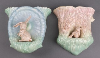 A 1930's Art Deco Sylvac Pottery wall pocket decorated a rabbit 20cm and 1 other decorated an elf 19cm 