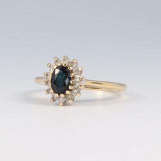 A 9ct gold sapphire and diamond cluster ring, size L, 2.3g