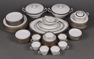 A 61 piece Noritake Julie pattern dinner service comprising 2 twin handled soup tureens and covers, large oval meat plate, small ditto, sauce boat and stand, 8 dinner plates, 8 soup bowls, 8 side plates, 8 tea plates, 8 pudding bowls, milk jug, lidded sugar bowl, 7 cups (1 rings flat), and 7 saucers 