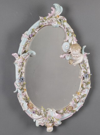 A 19th century Meissen style mirror with floral encrusted and cherub decoration 51cm x 38cm  