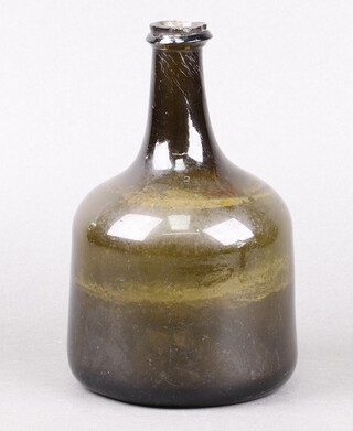 An 18th century green glass mallet shaped wine bottle 19cm 