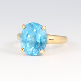 A 9ct gold ring set a blue stone, size L, 3.2g