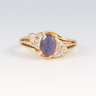 A 9ct gold ring set blue and white stones, size L, 2.8g