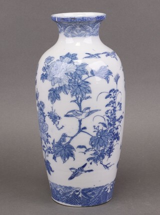 A Japanese porcelain vase decorated birds amidst branches 30cm h 