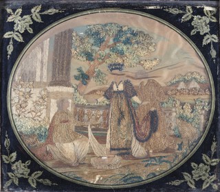 A George III oval silkwork picture of the Finding of Moses, circa 1800, worked in coloured and metallic threads, the figures with hand tinted features, 36cm x 40cm, within a verre eglomise mount and gilt composition frame.