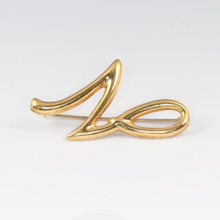 A gold marked 750 brooch in the form of an N, 2g
