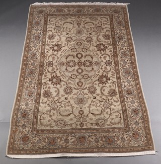 A grey and green Persian rug with central medallion and multi row border 216cm x 131cm  