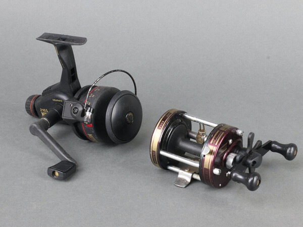 A Shakespeare Neptune fishing reel together with a